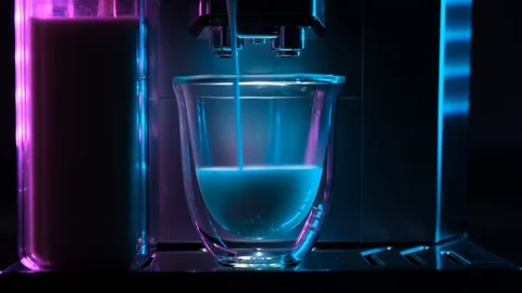 Coffee machine makes coffee with milk. Coffee machine with a cup of hot cappu Stock Footage 108235919