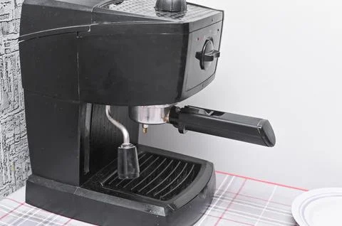 Coffee machine for making coffee in the kitchen Stock Photos