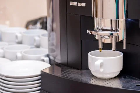 Coffee machine making espresso in a cafe Stock Photos