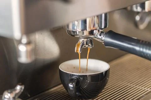 Coffee machine making espresso in a cafe Stock Photos