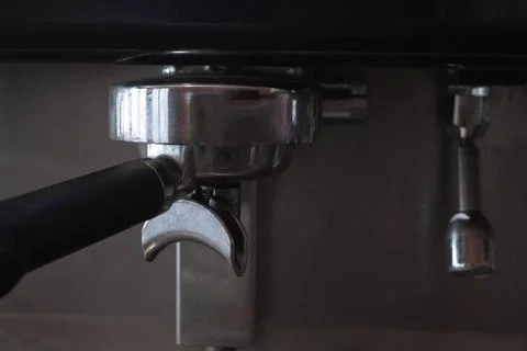 Coffee machine making espresso in a cafe, shallow depth of field Fotos de archivo