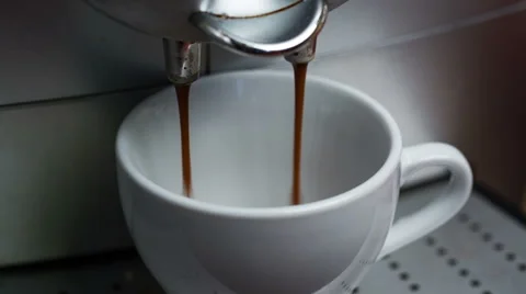 Coffee Machine Making Espresso into a Cap, closeup 스톡 동영상 40309624