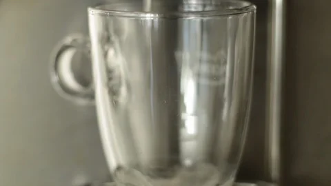 Coffee machine pouring a cafe latte Stock Footage 127850736