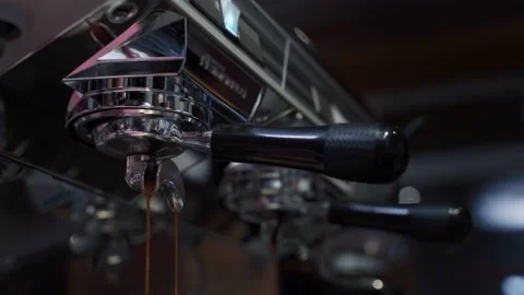 The coffee machine is pouring coffee. Video stock 165000955