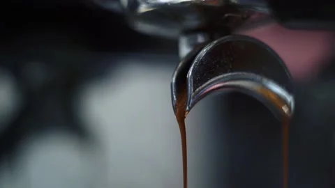 The coffee machine is pouring coffee. Video stock 165002443