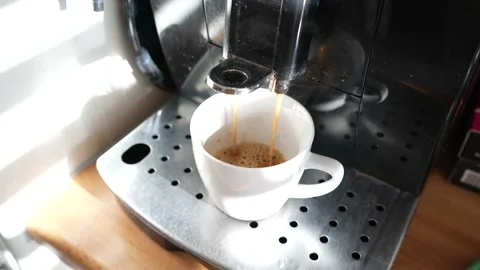 Coffee machine pouring coffee in the mug Stock Footage 228648496