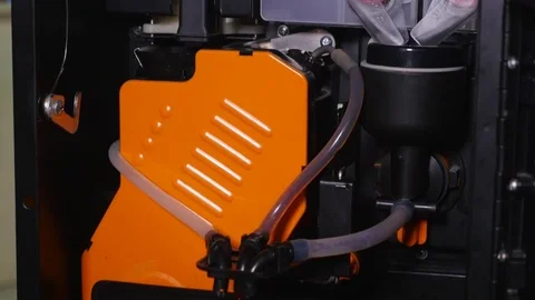 .Coffee machine pouring coffee in to the paper cup Stock Footage 78562031