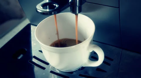 Coffee machine pouring espresso in cup Stock Footage 23016785