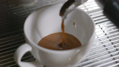 Coffee machine pouring espresso in cup Stock Footage 91087226