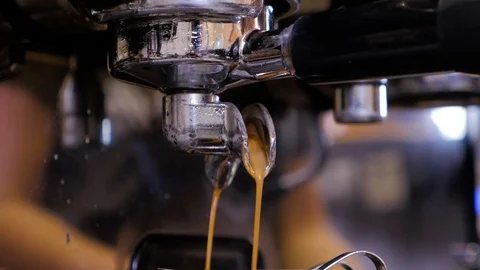 Coffee machine pouring espresso in cup. Close up. Stock Footage 105646251