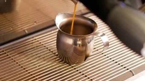 Coffee machine pouring espresso in cup. Close up. Video stock 106462021
