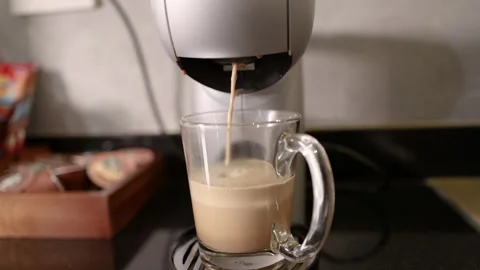 Coffee Machine Pouring Fresh Cappuccino into Glass Mug Stock Footage 346270705