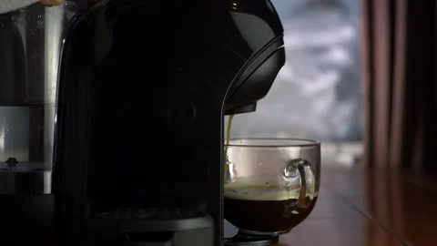 Coffee machine pouring fresh coffee into glass mug Stock Footage 146285492