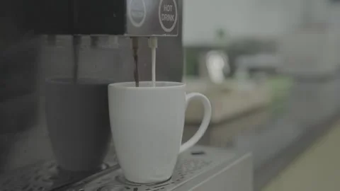 Coffee machine pouring milk into a white mug Stock-Footage 327443812