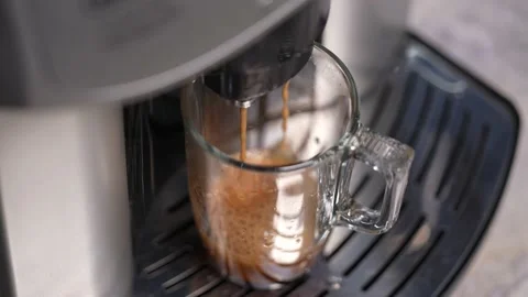 The coffee machine pours Americano coffee. Stock Footage 238700372
