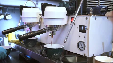 Coffee machine prepares drink in professional kitchen Spbas Stock Footage 147014781