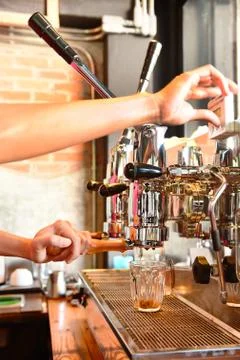 Coffee machine preparing cup of coffee Stock-Fotos