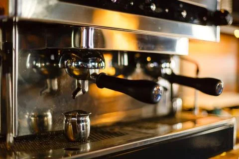 Coffee machine preparing cup of coffee. Stockfoto's