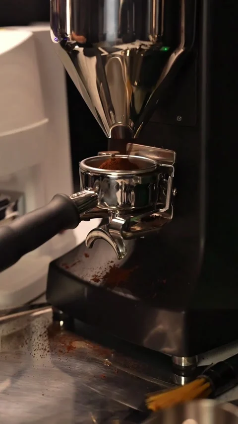 The coffee machine is processing coffee from the beans. Stock Footage 301748087