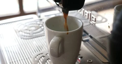 Coffee machine serving espresso on cup fresh hot beverage highest quality Stock Footage 84013349