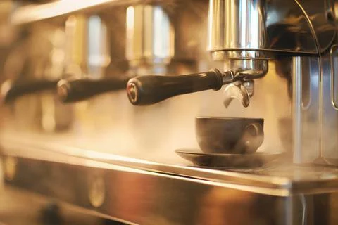 Coffee machine with steam in the process. Stock Photos