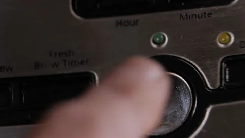 Coffee Machine Turn On - Clock changes to 7am - Tilt Down Stock Footage 149272935