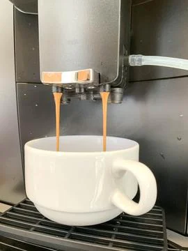 Coffee machine on working Stock Photos