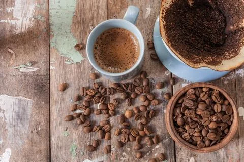 Coffee make with drip on wood table top view. Stock Photos