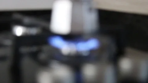 Coffee maker on the cooker Stock Footage 97757432