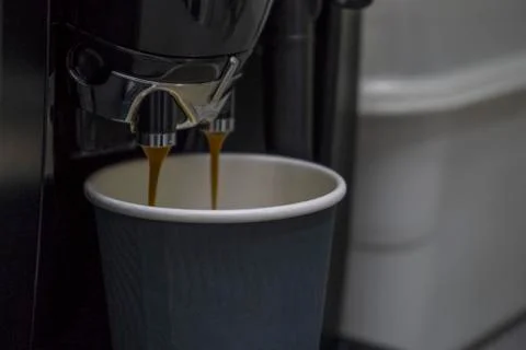 Coffee maker with cup in close up. Stock Photos