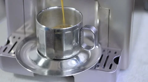 Coffee maker fills cup of coffee Stock Footage 44237876