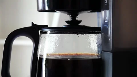 Coffee maker machine brewing bean equipment close up pouring water drip in 4k HD Stock Footage 336562046