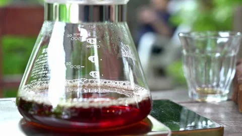 Coffee maker machine brewing bean equipment close up pouring water drip in 4k HD Stock Footage 336562050