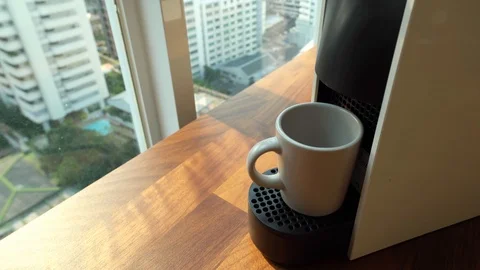 Coffee Maker Machine on the wooden tabletop. Closeup shot of Espresso. Stock Footage 126020873