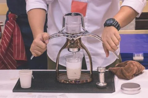 The coffee maker is not modern. Stock Photos