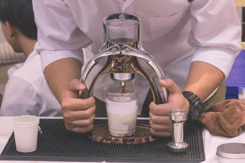 The coffee maker is not modern. Stock Photos