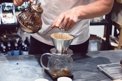 The coffee maker is not modern. Stock Photos