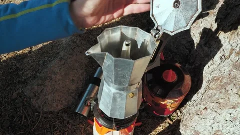 A coffee maker on a portable gas burner Stock Footage 144095441