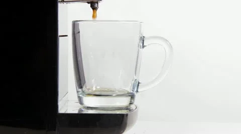 Coffee maker pours coffee into a cup. close-up Video stock 11438953