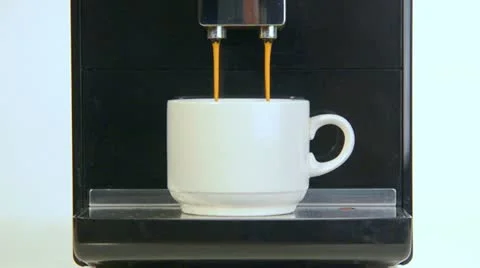 Coffee maker pours coffee into a cup. close-up Video stock 11439024