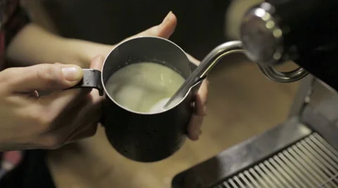 Coffee maker preparing hot milk foam Video stock 55550204