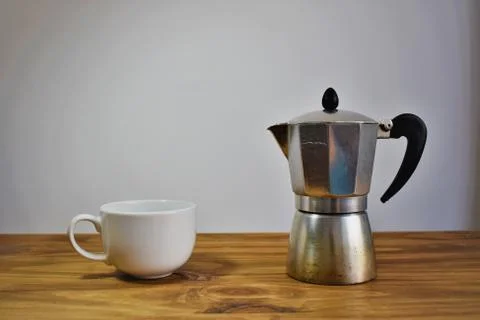 Coffee maker with a white cup Stock Photos