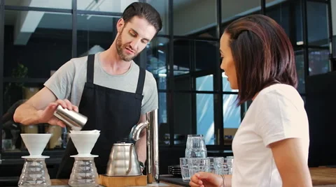Coffee making demonstration in cafe Stock Footage 58127338