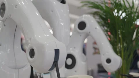 Coffee making robot prototype holding plastic cup at food expo booth. Stock Footage 304317451