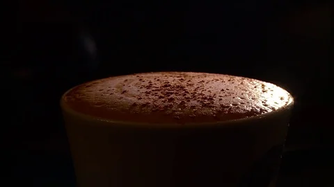 Coffee making, sprinkling with cinnamon. Stock Footage 79148548