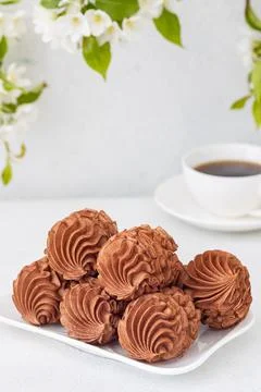 Coffee marshmallows for breakfast with a cup of fragrant coffee Stock Photos