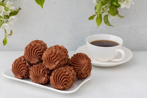Coffee marshmallows for breakfast with a cup of fragrant coffee Stock Photos