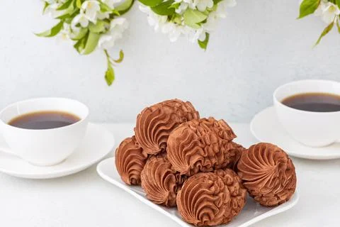 Coffee marshmallows for breakfast with a cup of fragrant coffee Stock Photos
