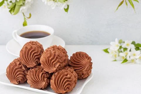 Coffee marshmallows for breakfast with a cup of fragrant coffee Stock Photos