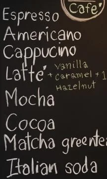 Coffee menu on the black board Stock Photos